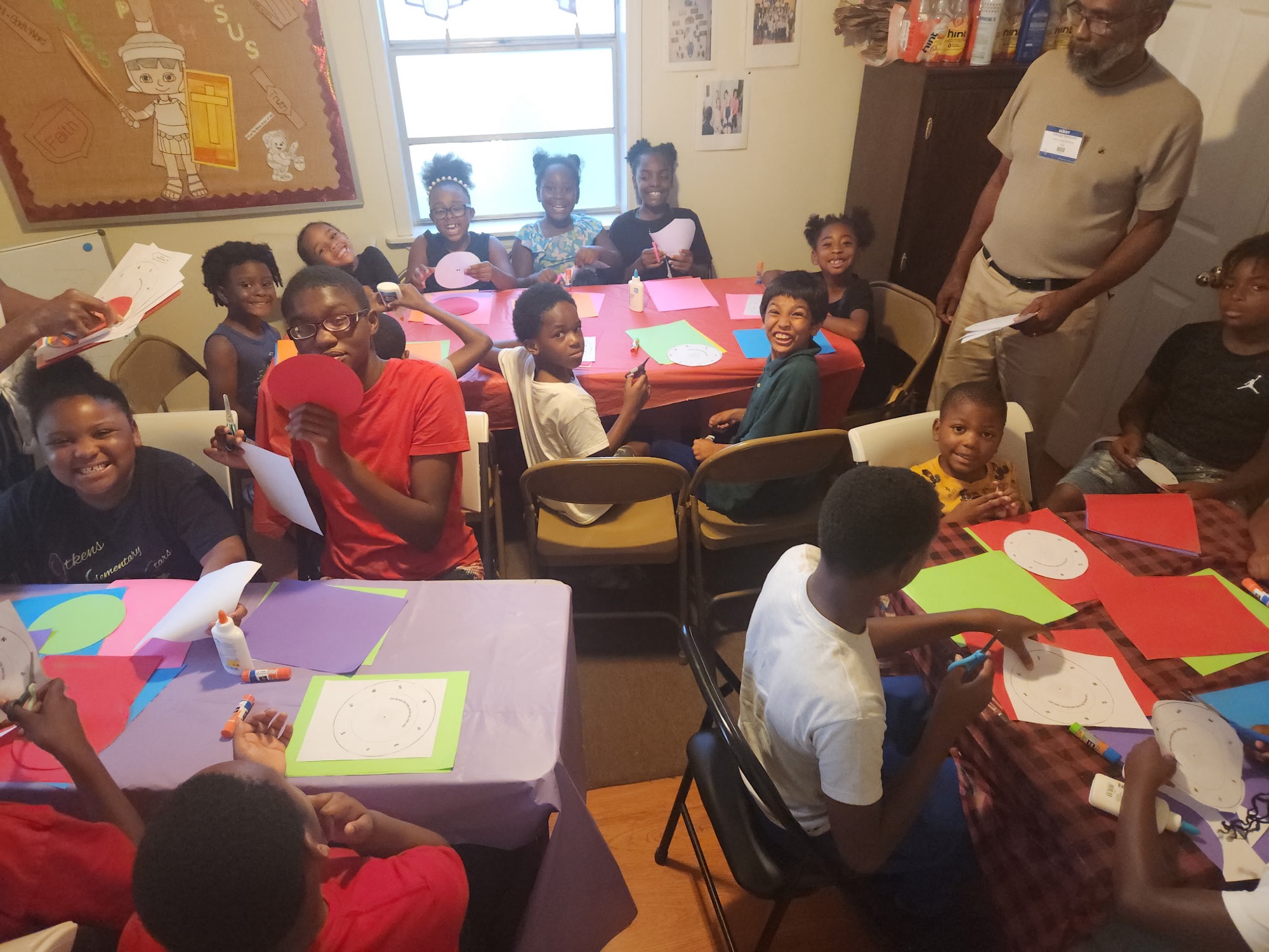 Children enjoying a craft activity at children's ministry
