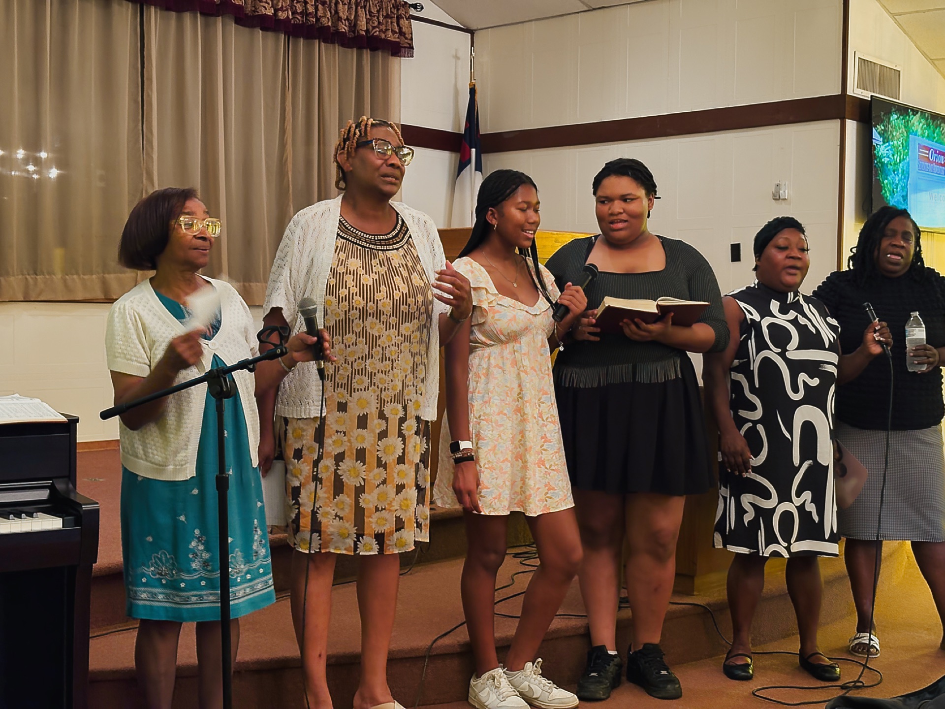 Congregation in reverent worship at Orion SDA Church